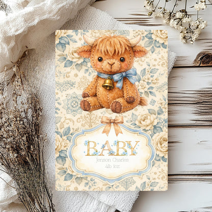 Highland cow new born baby card with personalised name and floral background on a rustic background