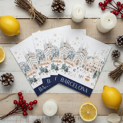 Christmas cards with Barcelona design on a wooden surface with lemons and candles